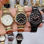 ساعت مچی مردانه عقربه ای طلایی و مشکی مارک معتبر WALAR طرح AP